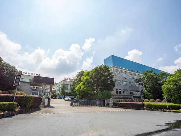 Wanchang Furniture factory campus entrance in Anji, China, with office building and production hall