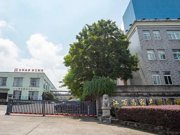 Main gate of Zhejiang Wanchang Furniture in Anji with the stone company-name sign