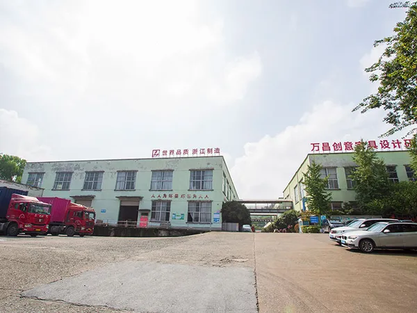 Container trucks loading at Zhejiang Wanchang Furniture workshop buildings in Anji
