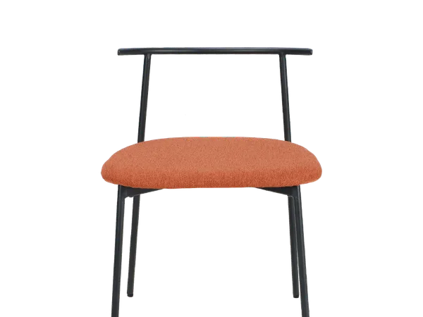 Silla de comedor con estructura metálica curvada — un artículo terminado que no existía en la fase de insumos, el núcleo de cualquier análisis de transformación